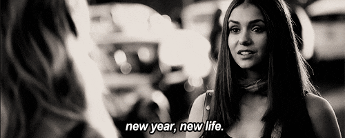 Black-and-white clip of a woman telling a friend, "New year, new life."