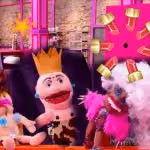 Puppets from the puppet mini challenge, including one with a gold crown and one with pink hair