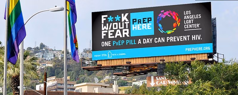 Los Angeles LGBT Center billboard reading "F**k without fear" and "One PrEP pill a day can prevent HIV"