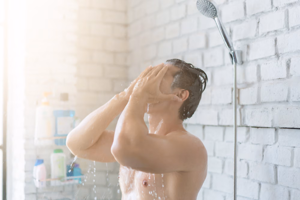 man showering