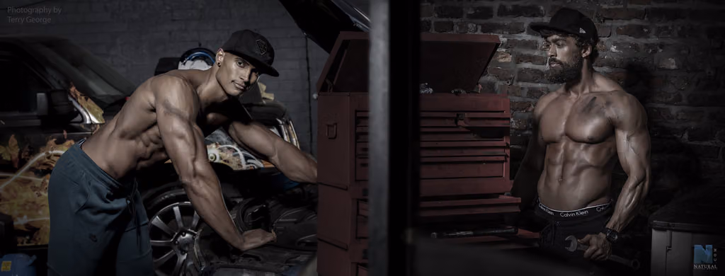 Two shirtless muscular men posing in a garage beside a car and a red tool chest