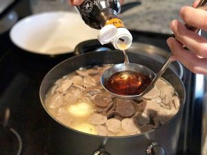 pouring fish sauce