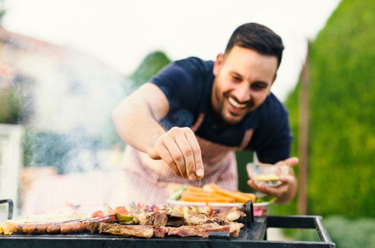 man grilling