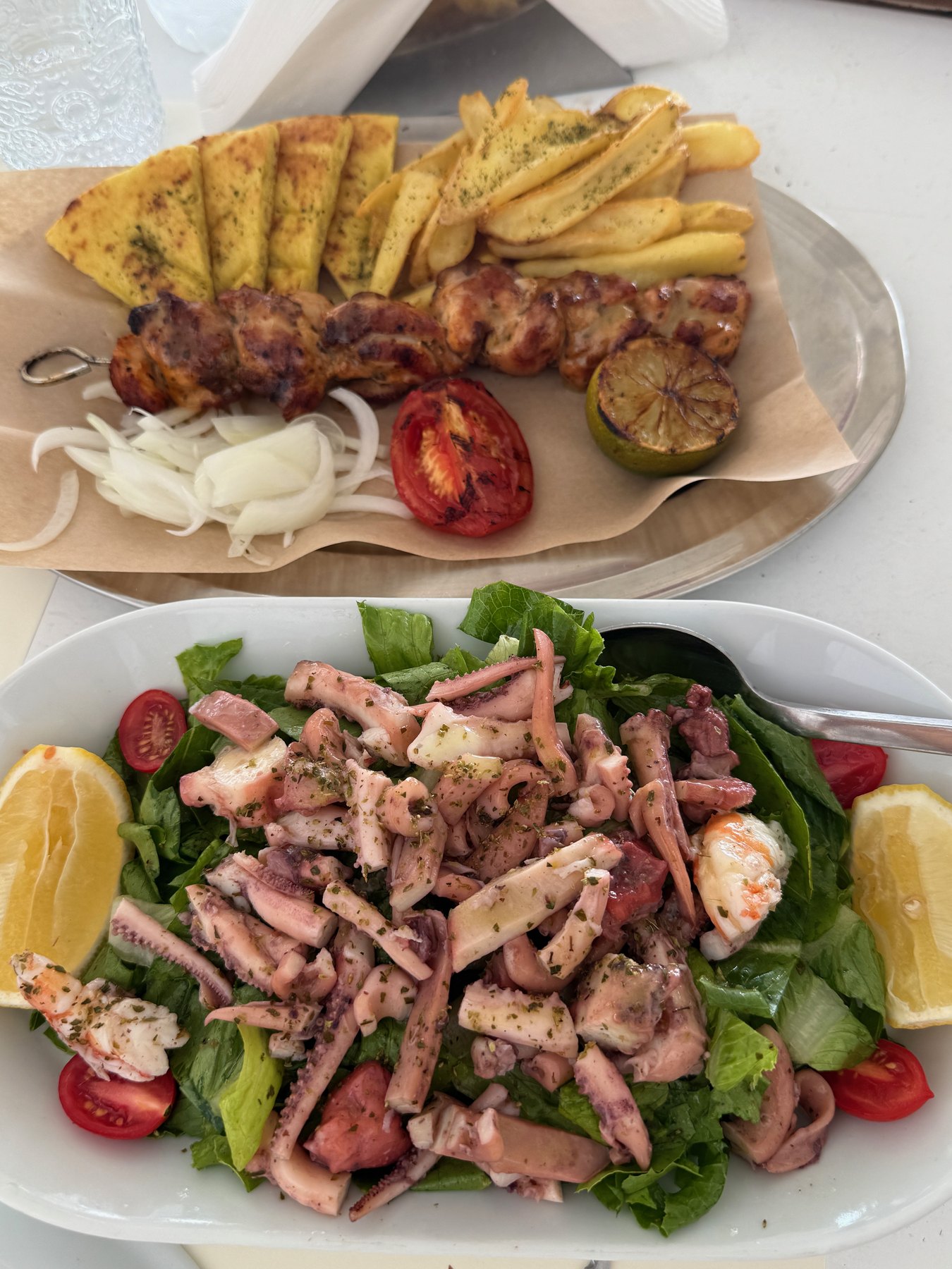 Souvlaki and seafood salad on our lunch table at Lalamou.
